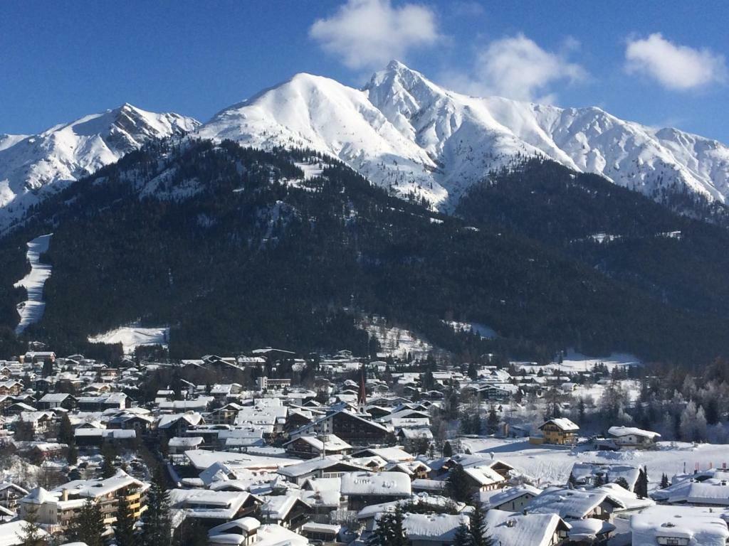 Apartment Cristina - Suedbalkon Mit Bergblick เซเฟลด์ อิน ทิโรล ภายนอก รูปภาพ